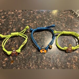 Three brand new Disney Parks Bracelets Two Goofy and One Donald Duck